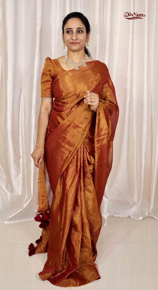 DC166 | Tissue Linen Saree with Golden Zari & Pom-Pom Tassels | Lightweight Festive Wear Saree