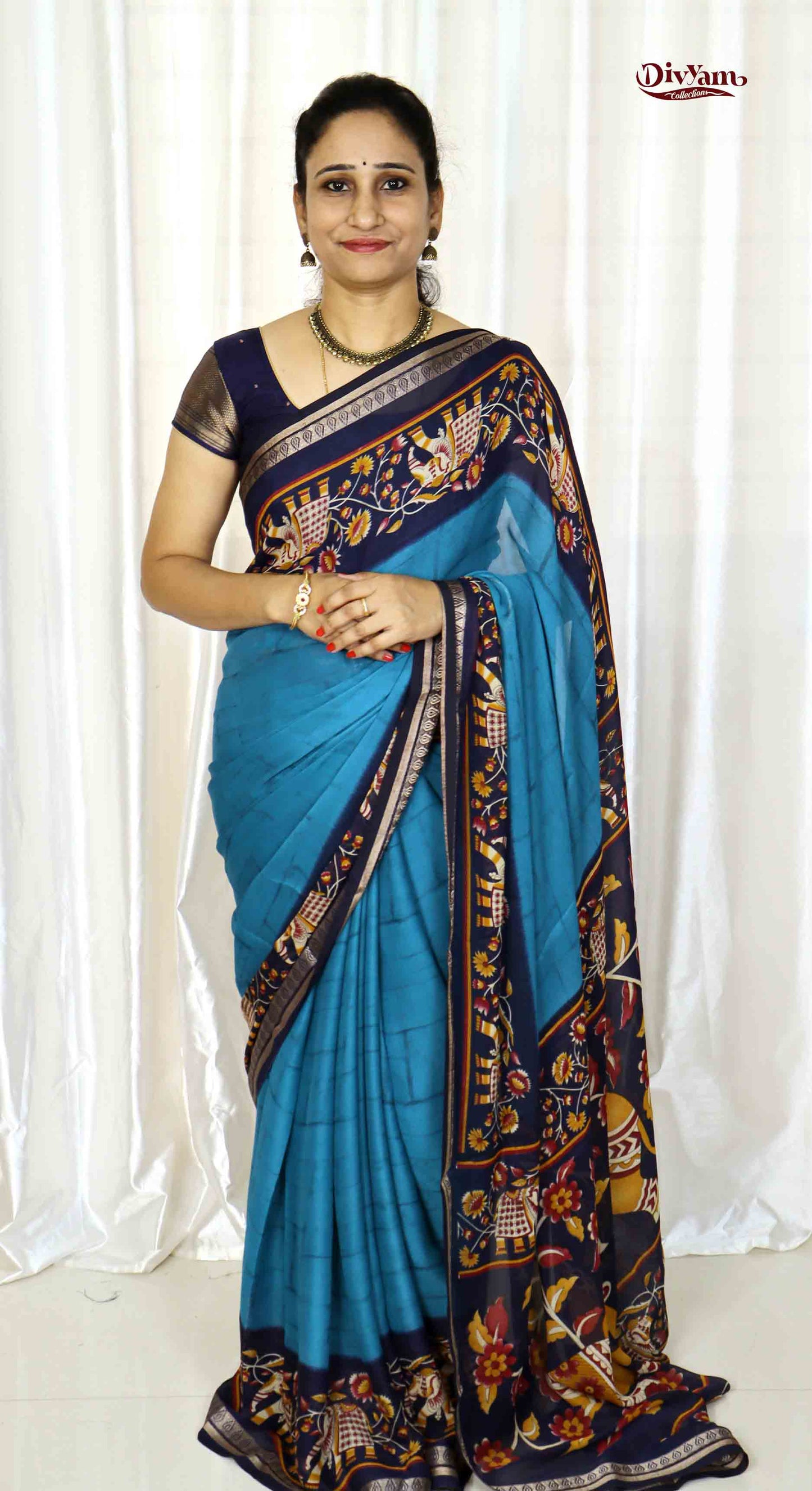 DC222 | Semi Viscose Georgette Saree with Zari Temple Border