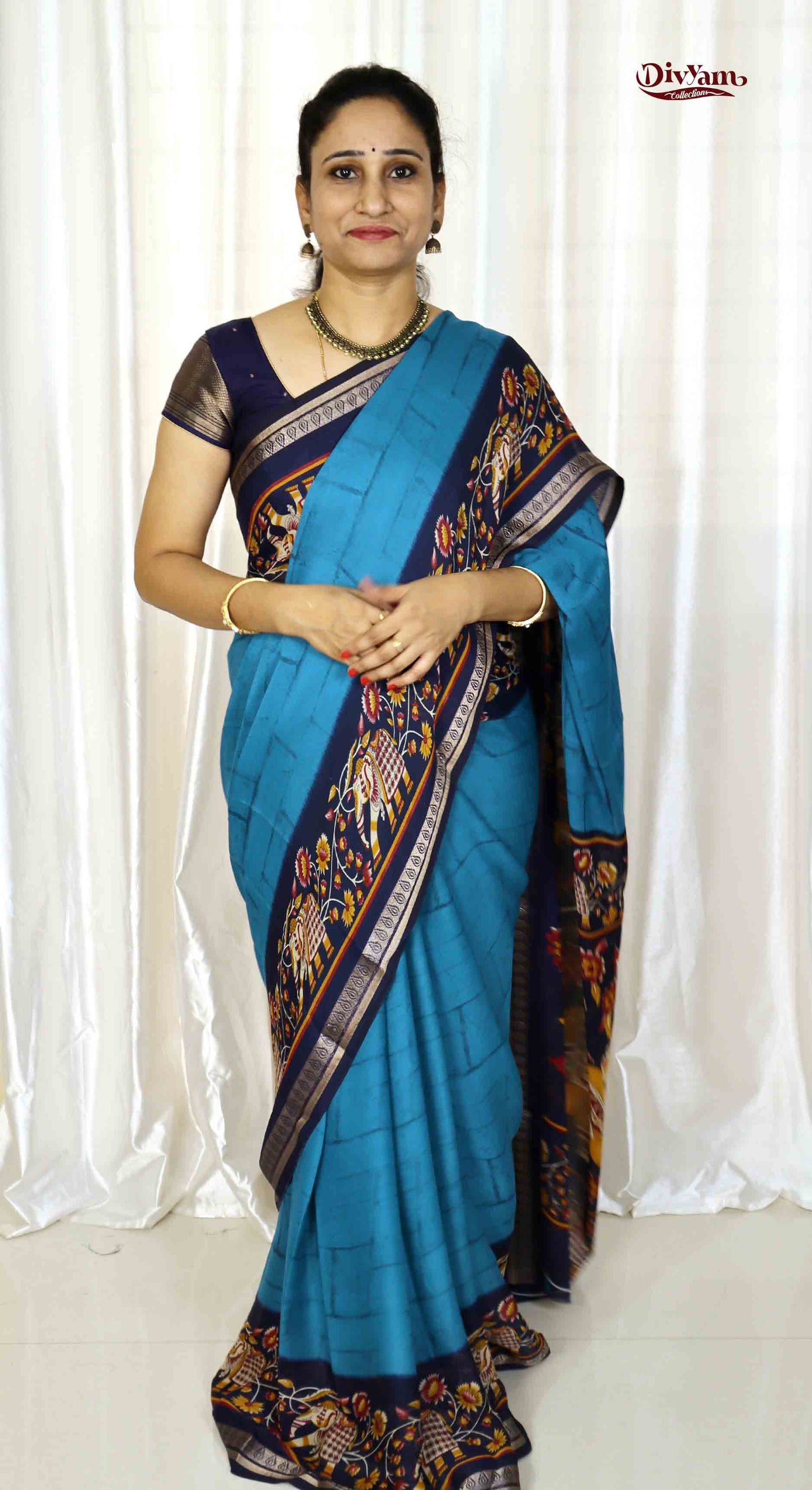 DC222 | Semi Viscose Georgette Saree with Zari Temple Border