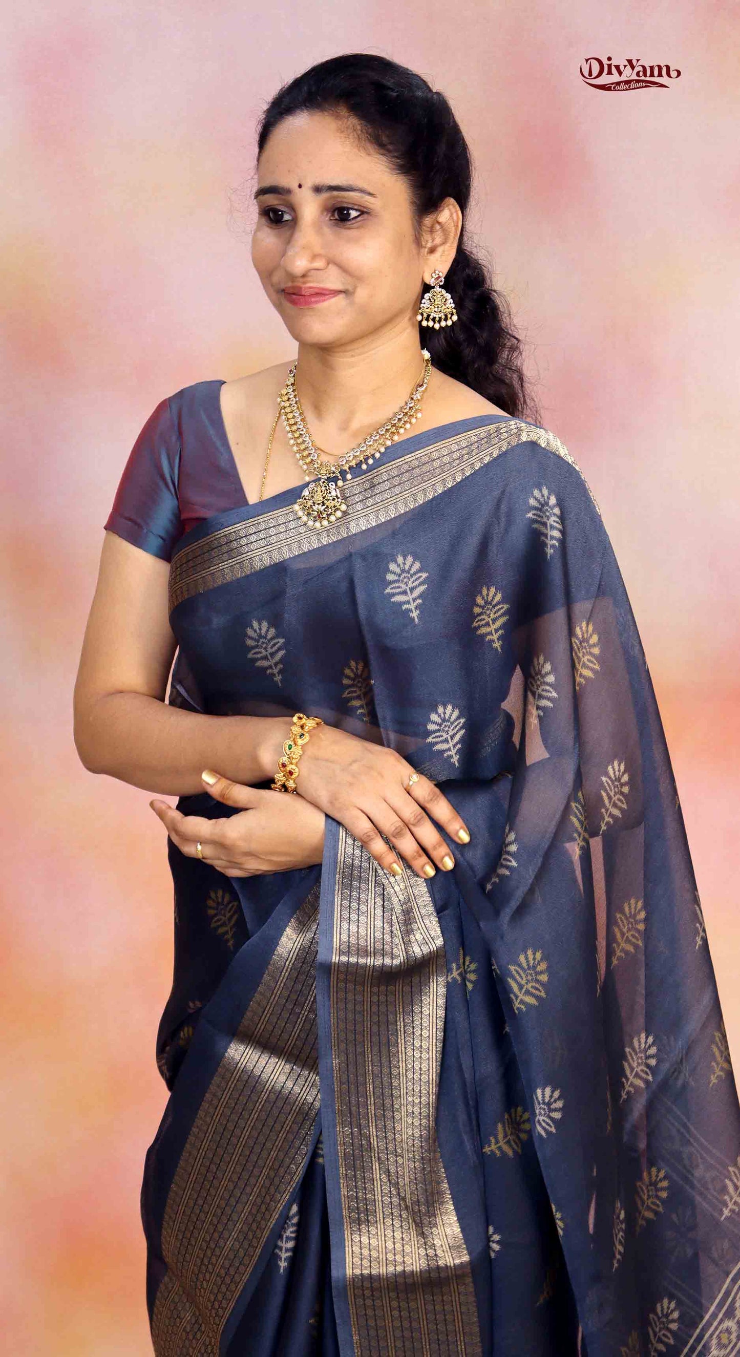 DC257 | Chinnon Crepe Saree with Floral Buttis & Jacquard Zari Border