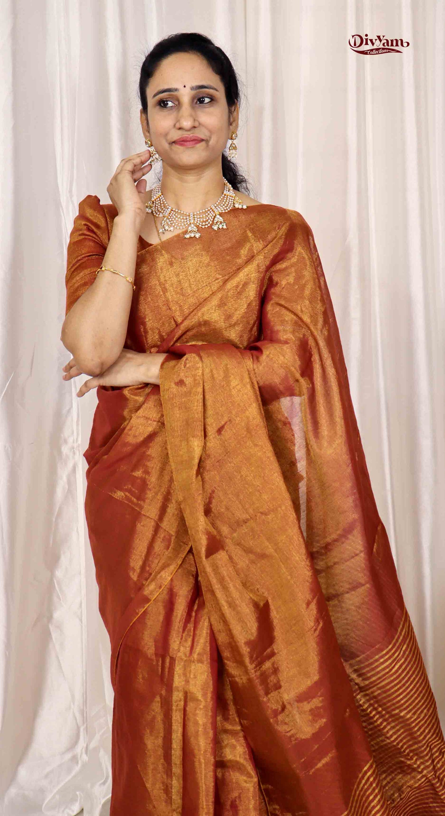 DC166 | Tissue Linen Saree with Golden Zari & Pom-Pom Tassels | Lightweight Festive Wear Saree