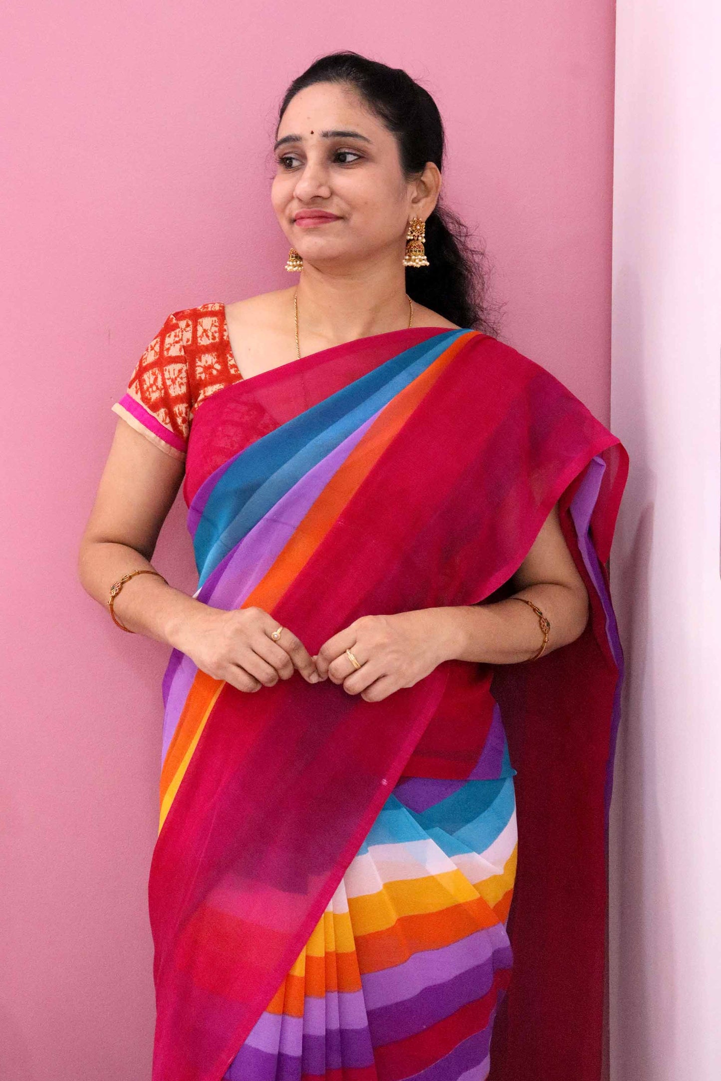 DCGE74 Rainbow Striped Georgette Saree with Floral Fancy Silk Design & Orange Hues