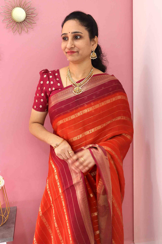 DC118 | Dark Orange Fancy Silk Saree with Gold Zari Lines & Animal Motif Border | Contrast Blouse