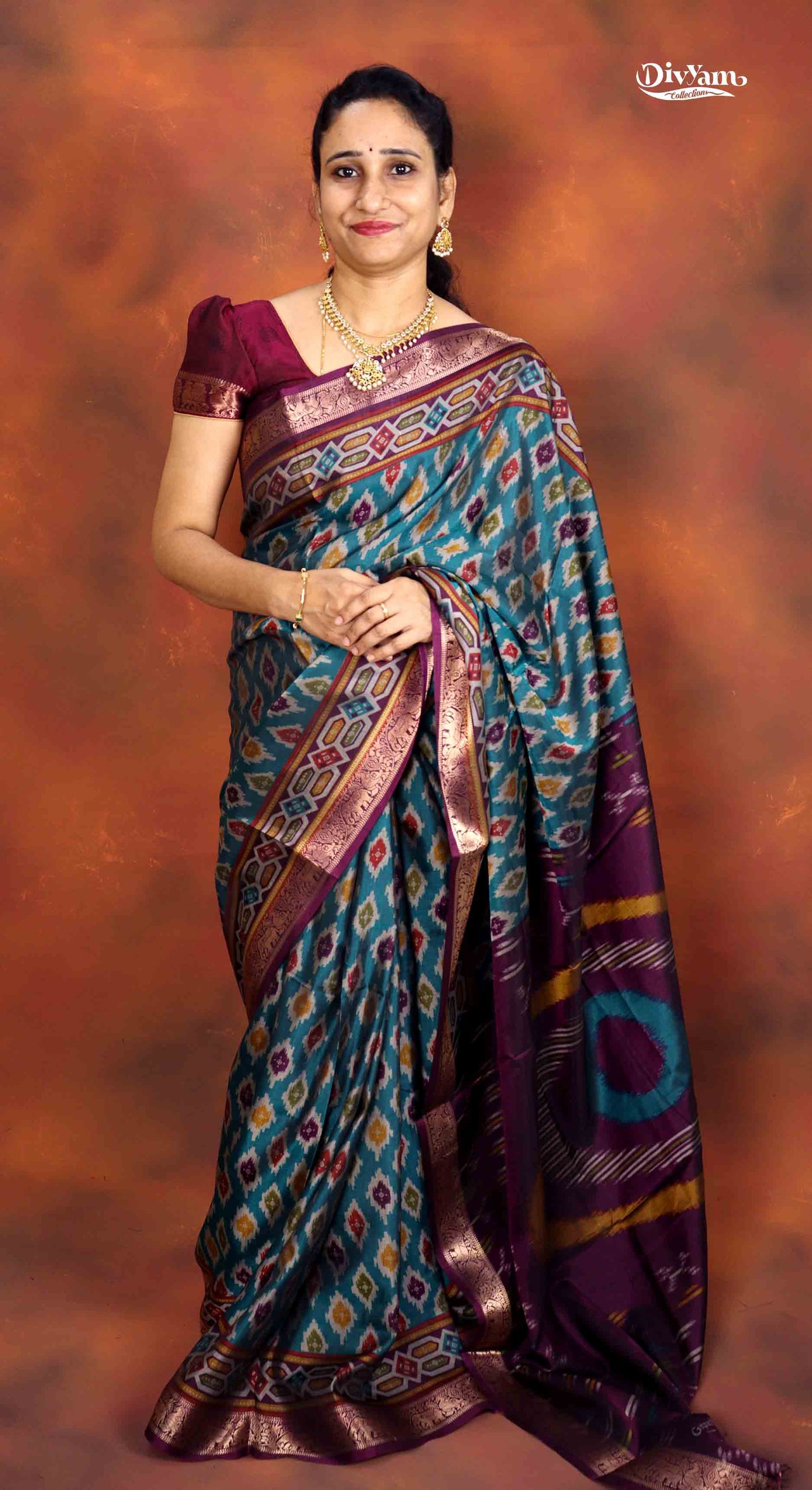 DC230 | Maheswari Silk Saree with Ikat Print & Pichwai Zari Border