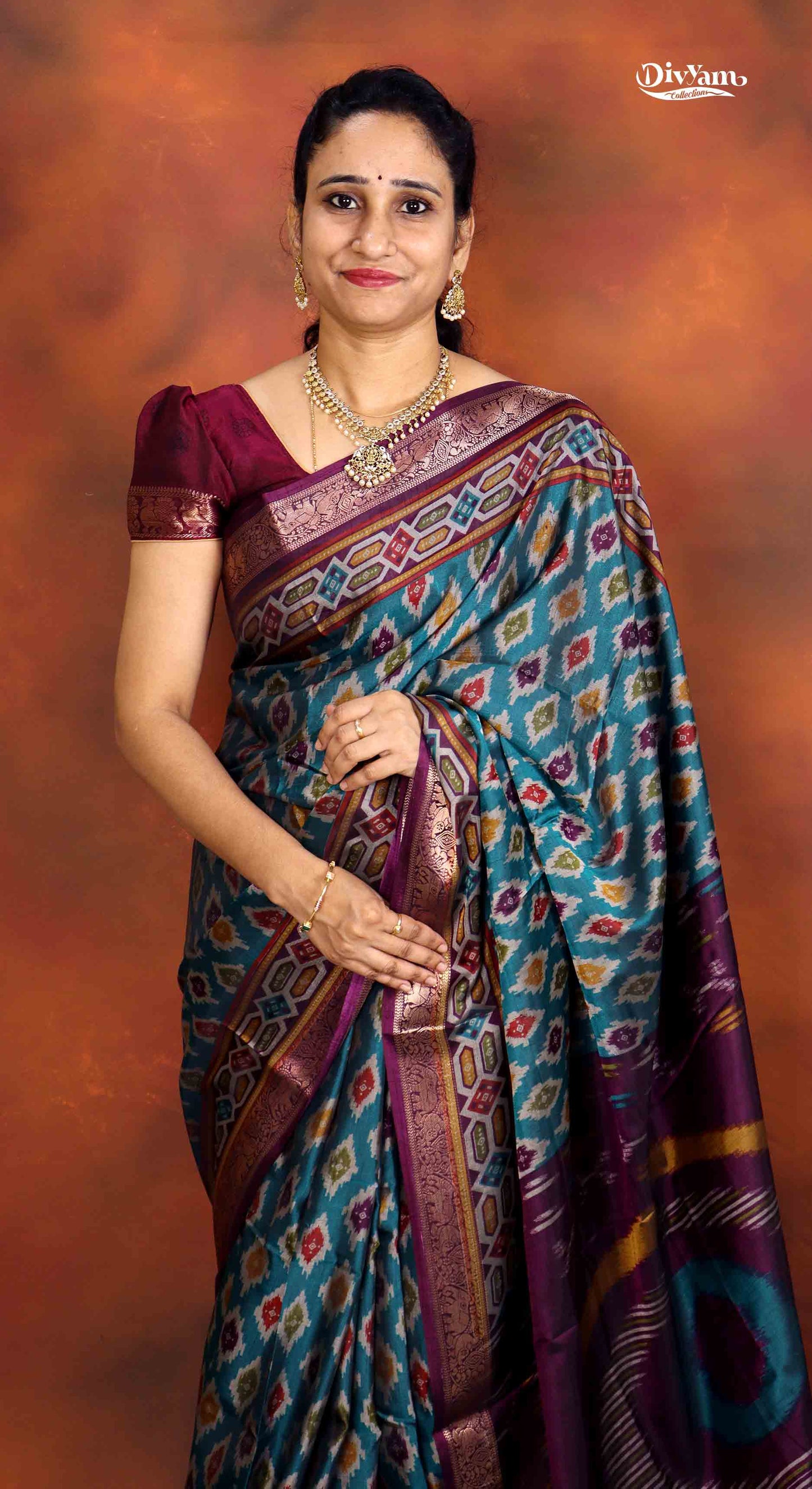 DC230 | Maheswari Silk Saree with Ikat Print & Pichwai Zari Border