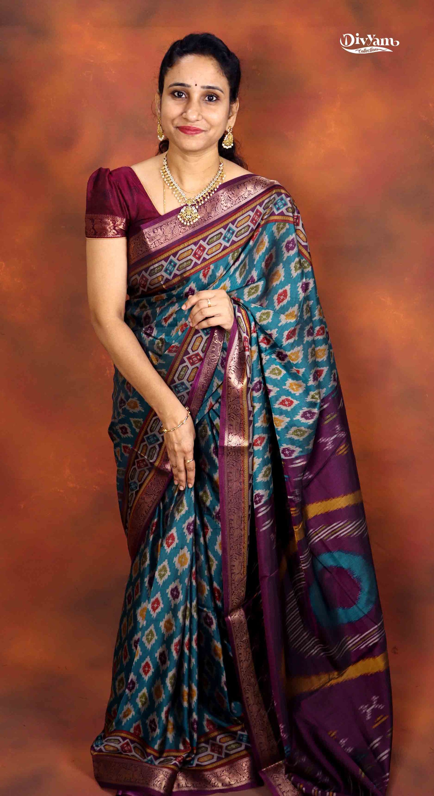 DC230 | Maheswari Silk Saree with Ikat Print & Pichwai Zari Border