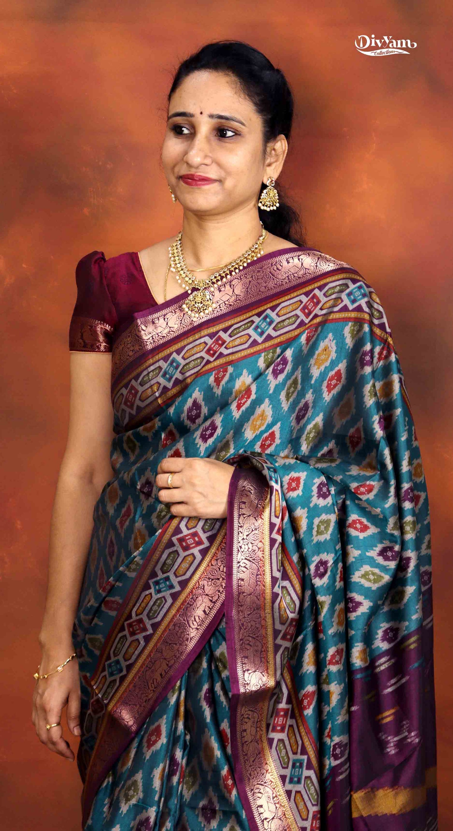 DC230 | Maheswari Silk Saree with Ikat Print & Pichwai Zari Border