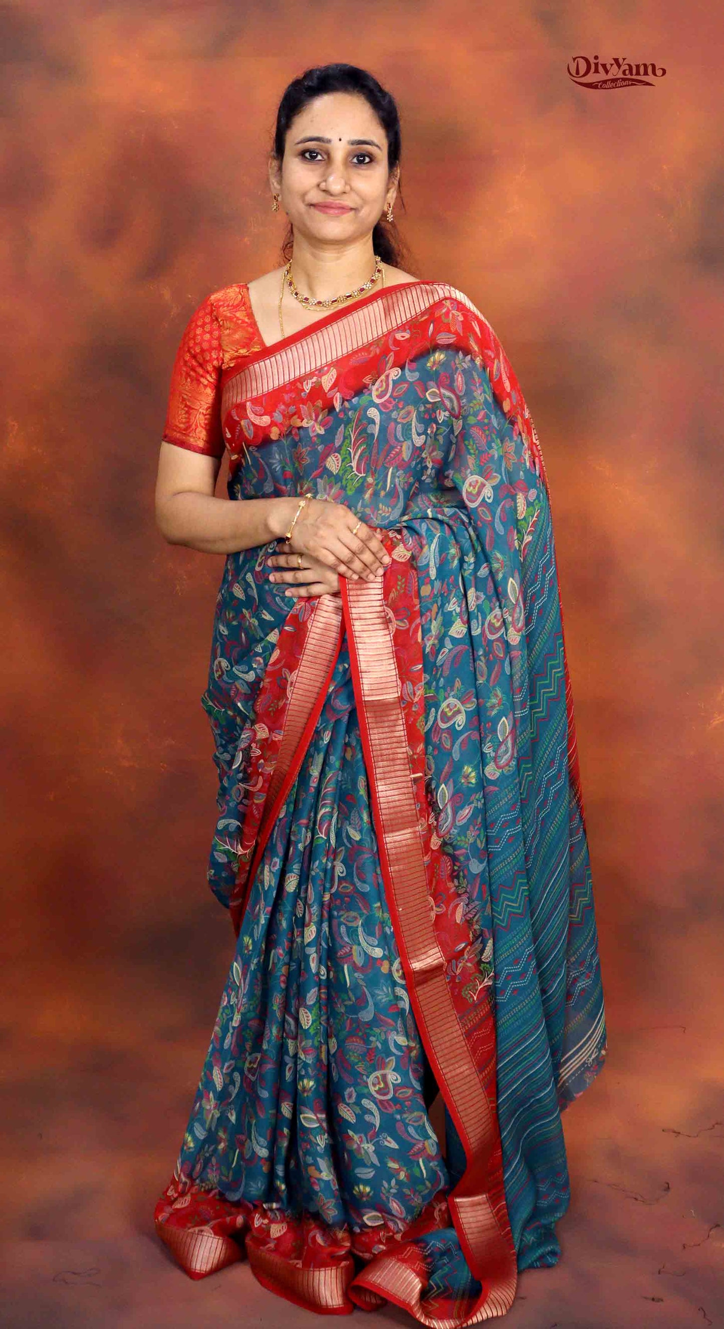 DC188 | Soft Georgette Kalamkari Print Saree with Jari Piping Border & Contrast Blouse