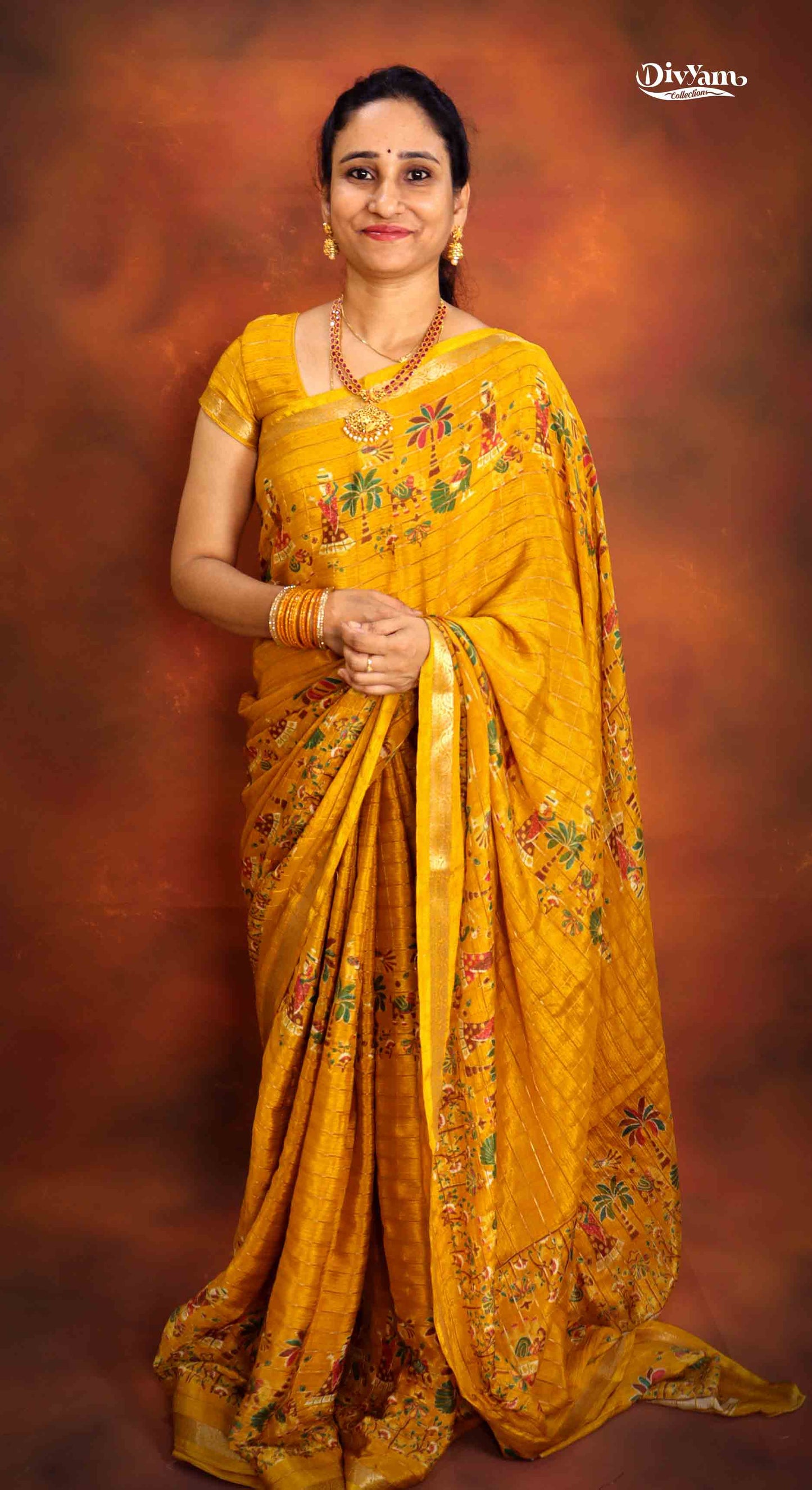 DC177 | Premium Chinon Crêpe Pattachitra Hand-Painted Saree with Jari Checks & Floral Accents